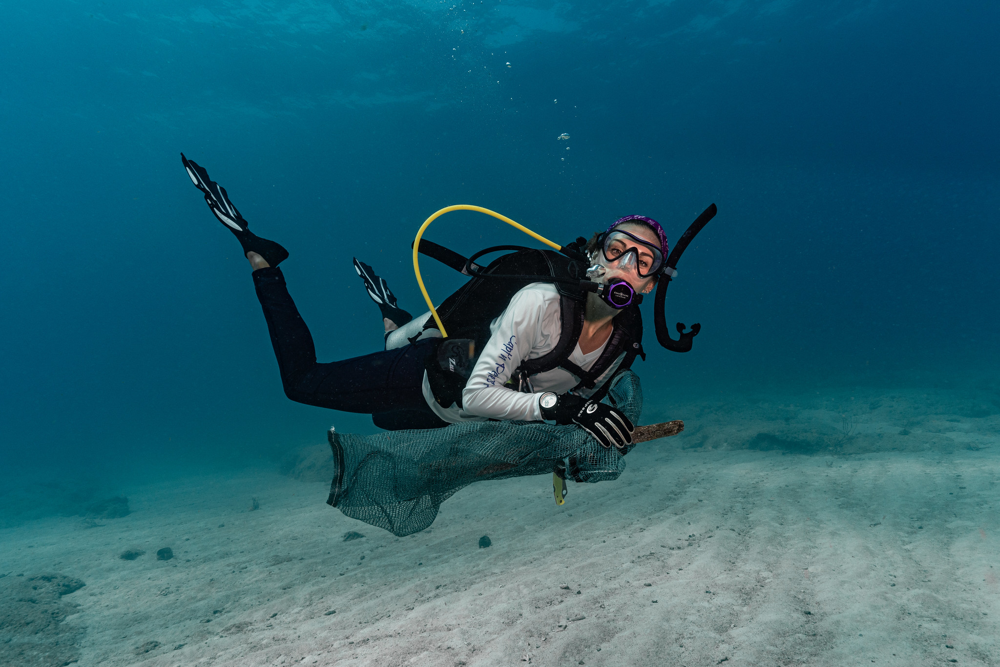 diver taking action underwater